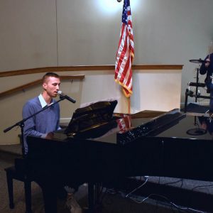 Members of the worship team on piano and drums